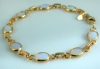 Death Watch - 14kt Gold Fiery Opal Bracelet 7"